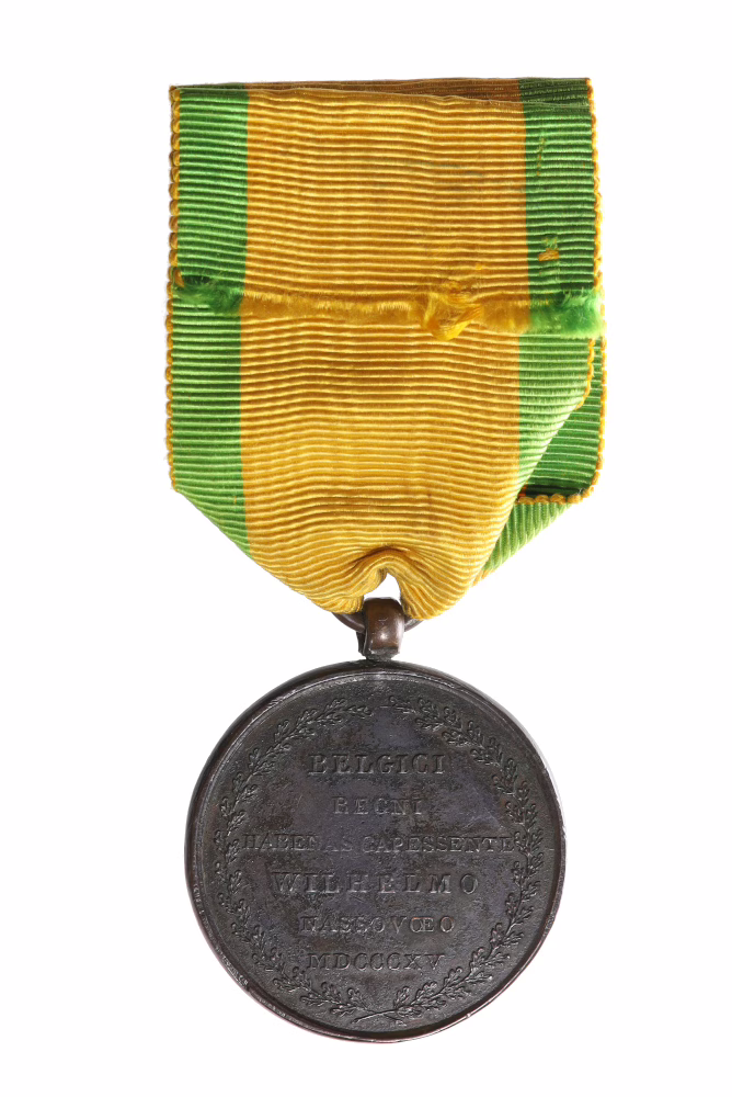 The Brussels 1815 Medal, a military decoration from 1815; the reverse bears the inscription ‘BELGICI REGNI HABENAS CAPESSENTE WILHELMO NASSAVŒO MDCCCV’