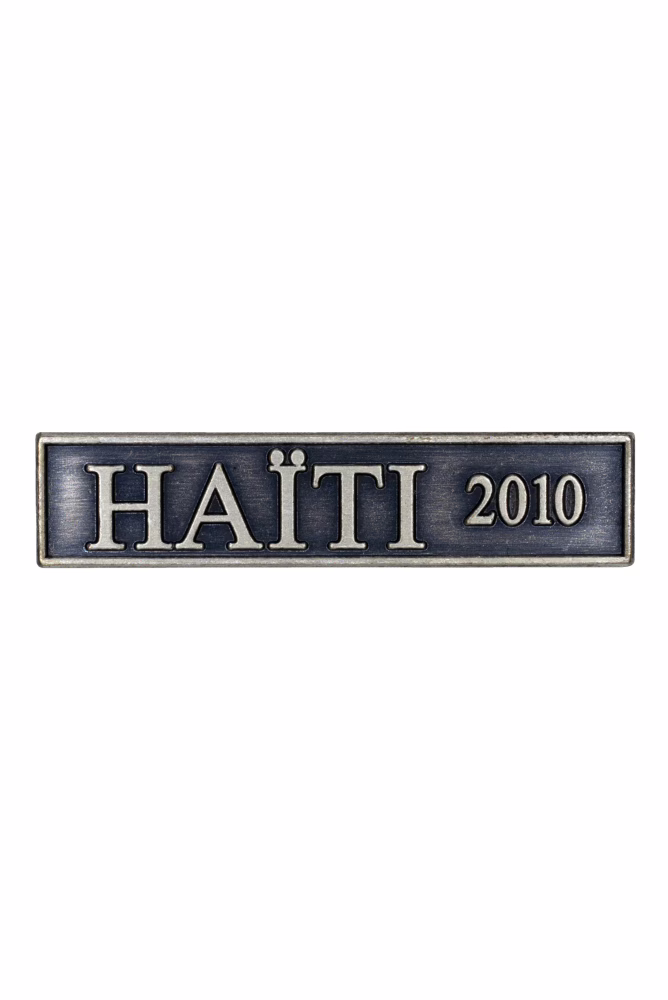The Commemorative Medal for Humanitarian Aid in the Event of Disasters, medal with clasp ‘HAITI 2010’
